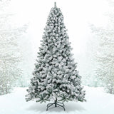 Árbol de Navidad artificial de 9 pies con bisagras y nieve artificial de primera calidad
