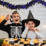 Guirnalda de Navidad y Halloween de 9 pies preiluminada con 50 luces LED moradas