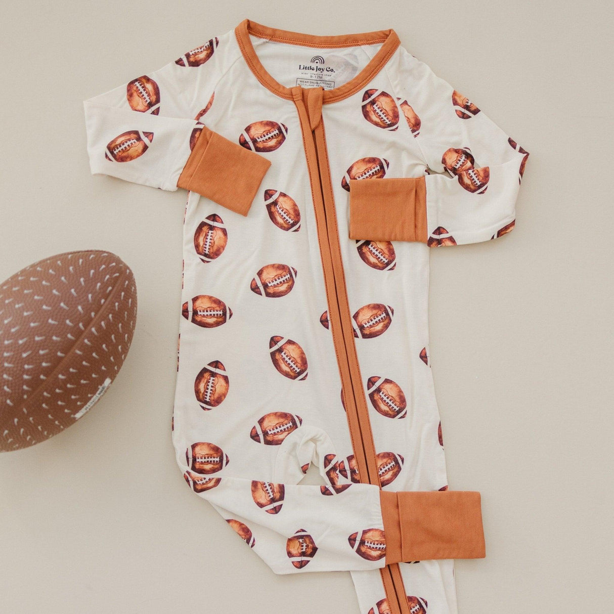 Pelele de bambú con cremallera y estampado de fútbol