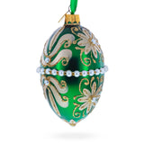 Beaded Center & Golden Flowers On Green Glass Egg Ornament 4 Inches