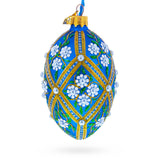 White Pearl Flowers on Blue Glass Egg Ornament 4 Inches