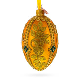 Glittered Golden Leaves Orange Glass Egg Ornament 4 Inches
