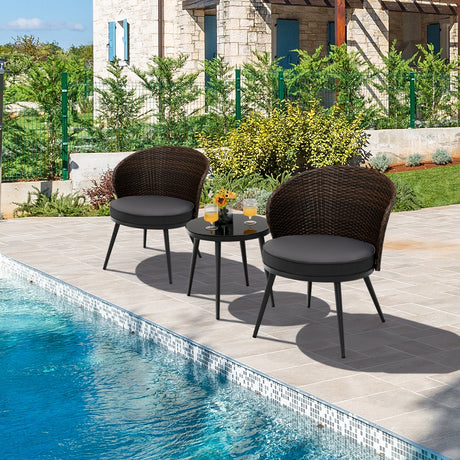 Juego de bistró de ratán para patio de 3 piezas con 2 cojines de asiento y mesa de centro de vidrio templado - Marrón