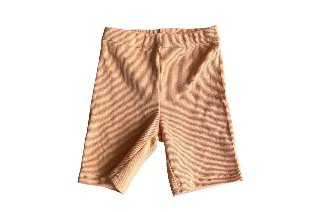 Pantalones cortos de ciclista acanalados de color naranja