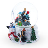 Penguins' Festive Tree Celebration Snow Water Globe