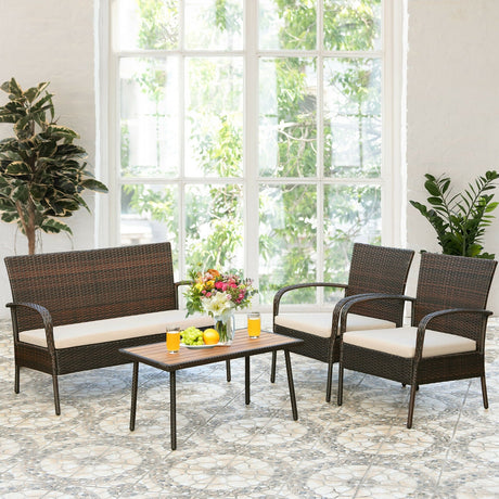 Juego de conversación de mimbre acolchado de 4 piezas para patio con tablero de mesa de madera de acacia